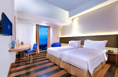 Minibar, in-room safe, desk, free WiFi. Aston Palembang Hotel & Conference Center