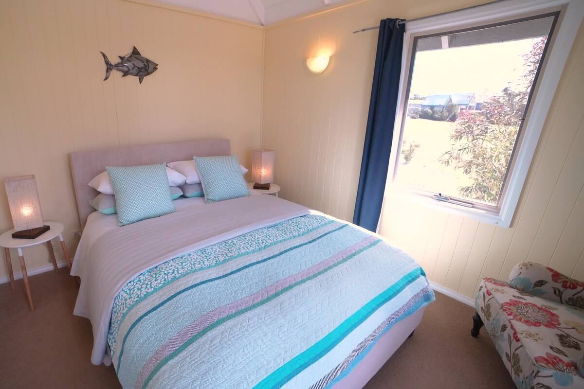 2 bedrooms, blackout drapes, soundproofing, iron/ironing board