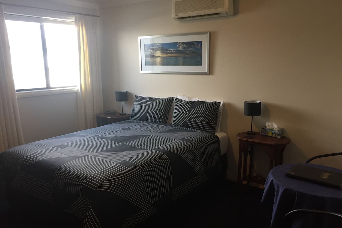 King Room Accessible | Desk, laptop workspace, blackout drapes, iron/ironing board