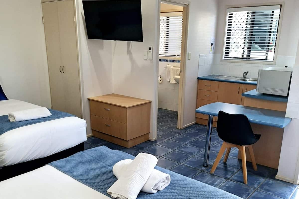 Family Studio, Multiple Beds, Non Smoking, Kitchenette | Premium bedding, desk, laptop workspace, blackout drapes