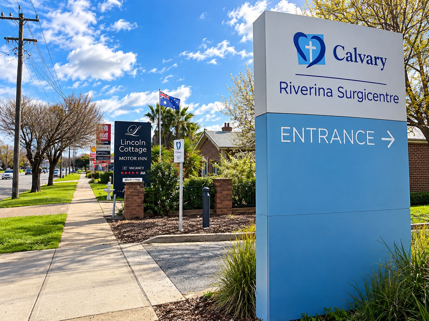A sign for Calvary Riverina Surgicentre with an entrance arrow.