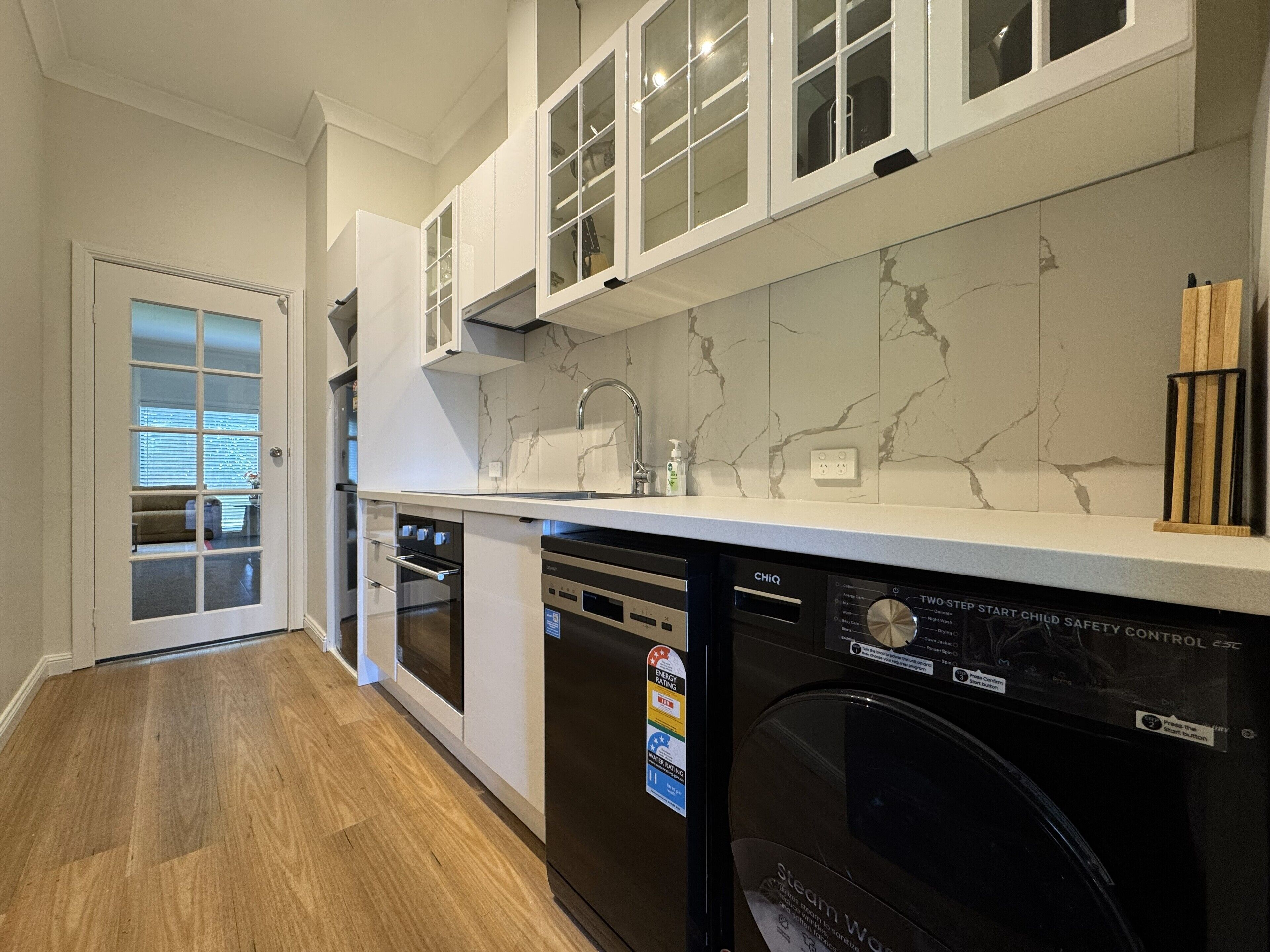 Departamento Confort | Cocina privada | Refrigerador y cafetera y tetera 