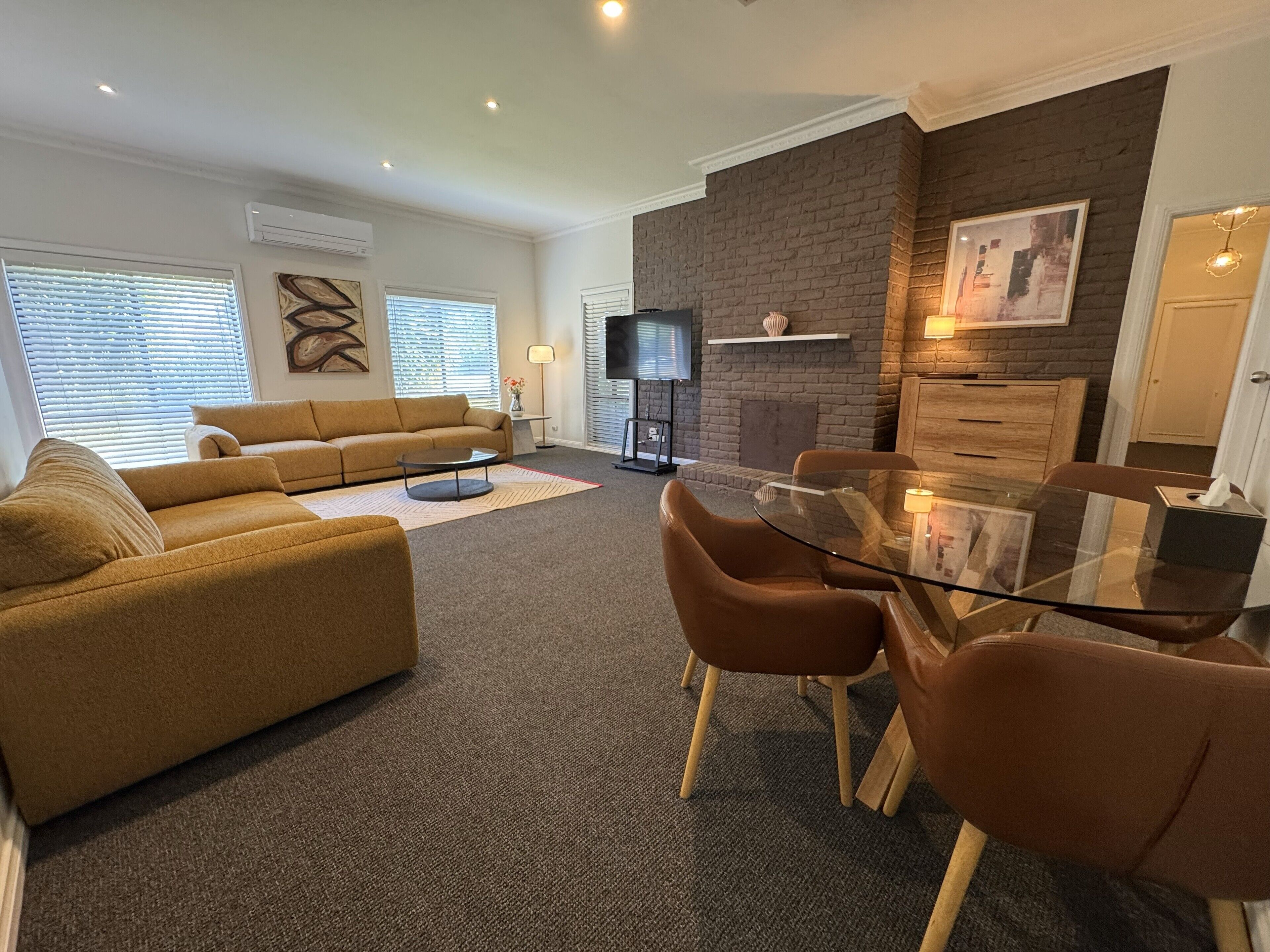 Departamento Confort |  Área de sala de estar | Televisión 