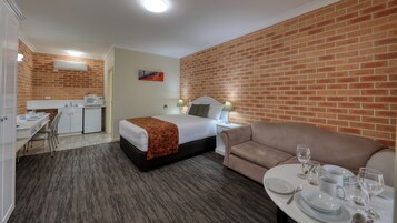 Family Room | Desk, blackout drapes, soundproofing, iron/ironing board