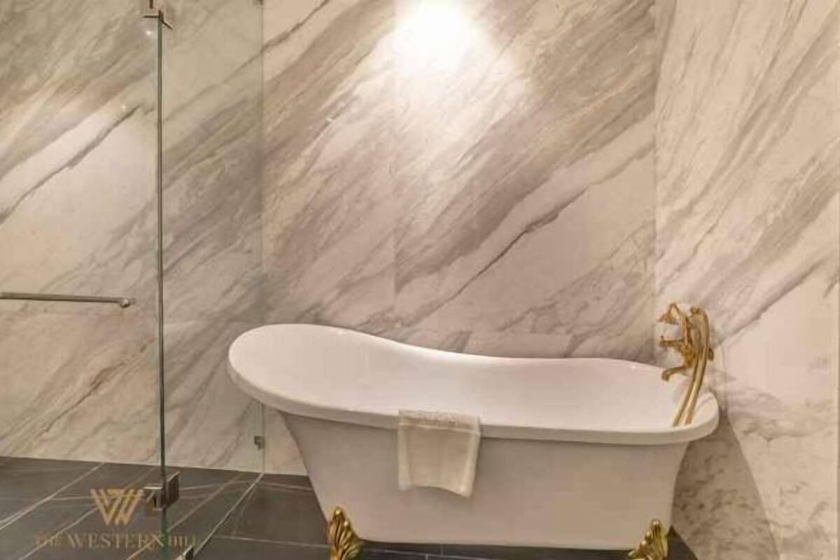 Combined shower/tub, designer toiletries, hair dryer (on request)
