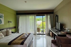 Suite Deluxe | Minibar, camas extra, wifi gratis y ropa de cama 