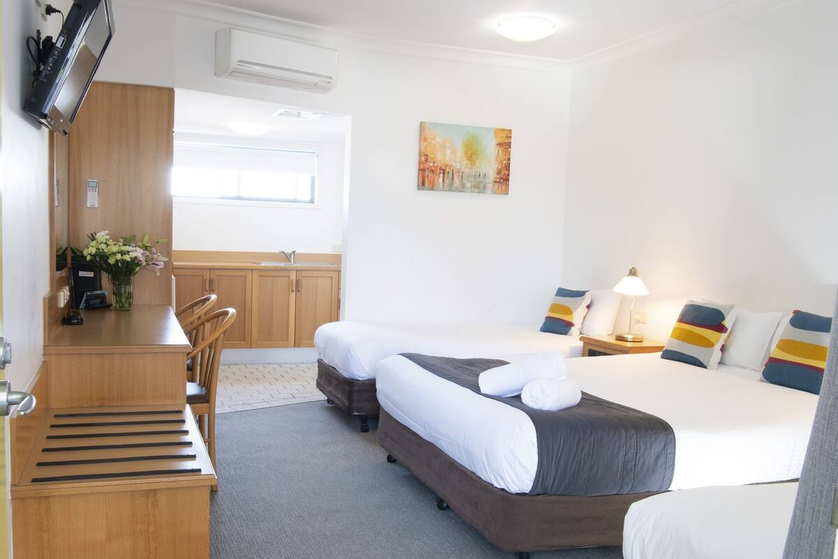 Family Room | Pillowtop beds, minibar, in-room safe, desk