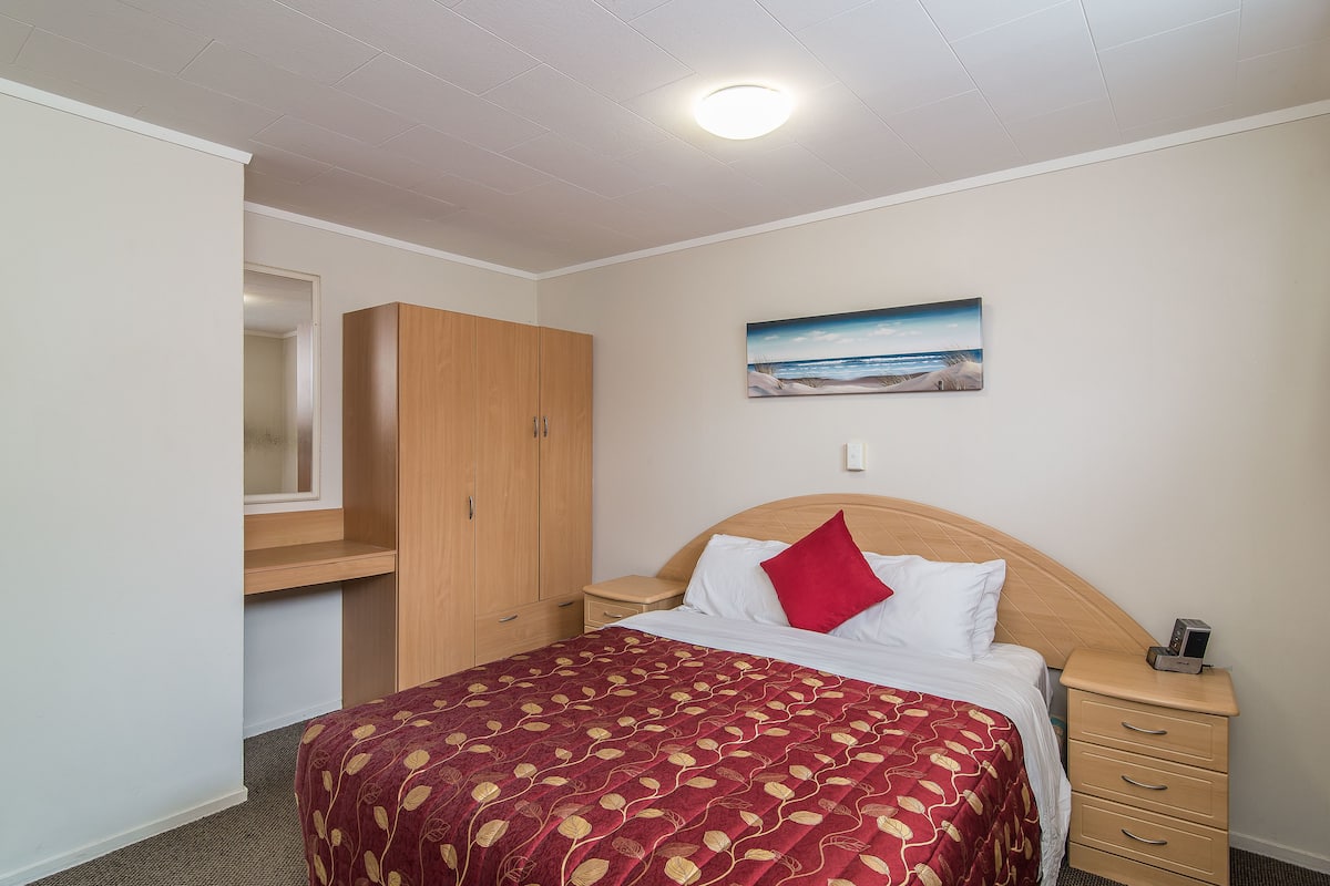 Premium bedding, desk, blackout drapes, iron/ironing board