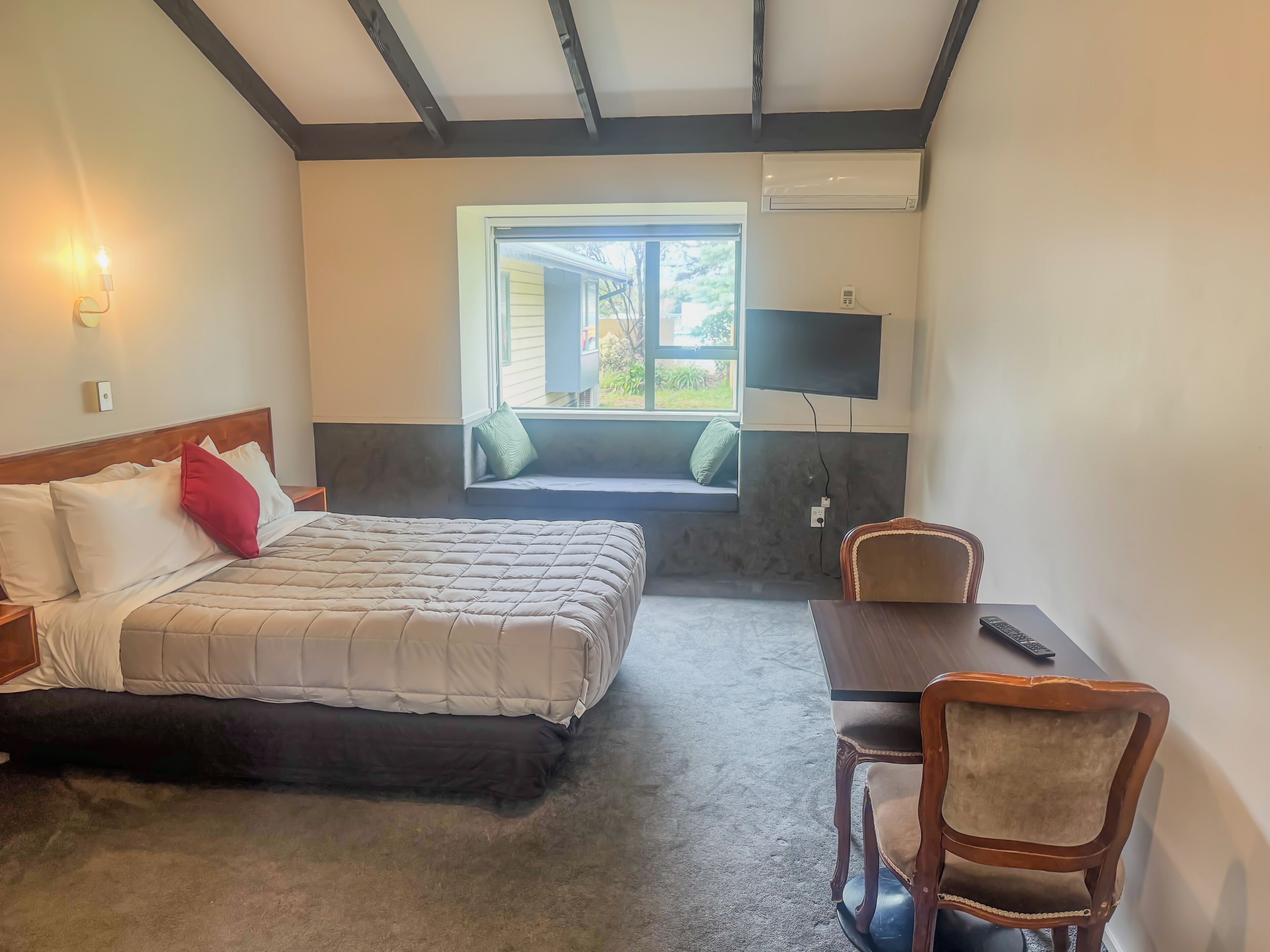 Standard Studio | Premium bedding, desk, blackout drapes, iron/ironing board