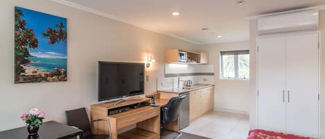 Premium bedding, desk, blackout curtains, iron/ironing board