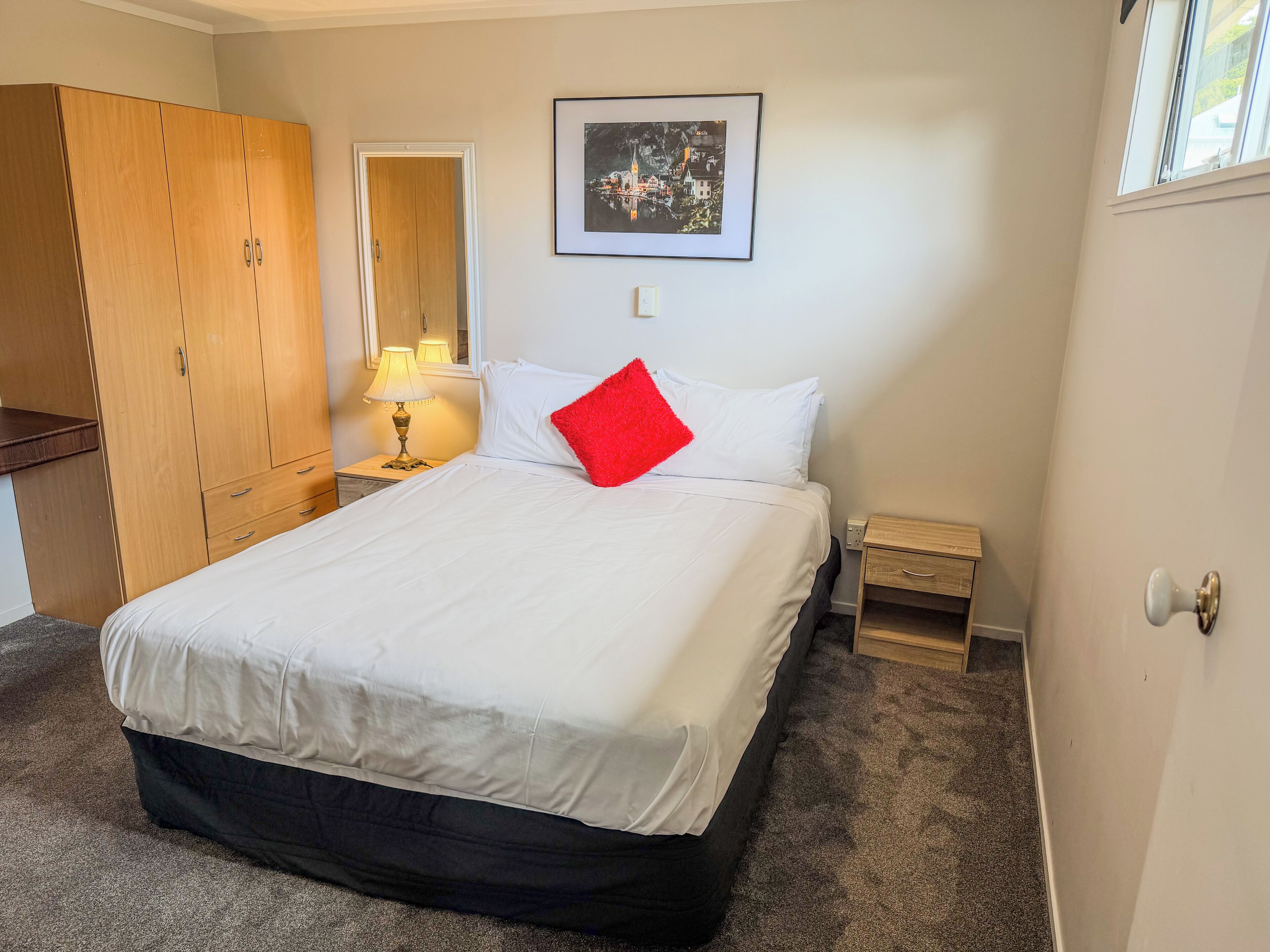 Premium bedding, desk, blackout drapes, iron/ironing board