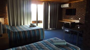 Family Suite, 2 Bedrooms, Non Smoking, Ground Floor | Desk, soundproofing, iron/ironing board, bed sheets