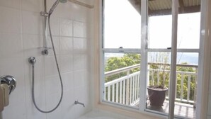 Standard Room, Non Smoking, Kitchenette (Cottage) | Bathroom shower - At Sunrise Cottages (Montville)