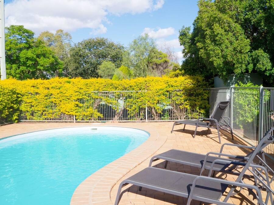 Outdoor pool, open 7:00 AM to 9:00 PM, pool umbrellas, pool loungers