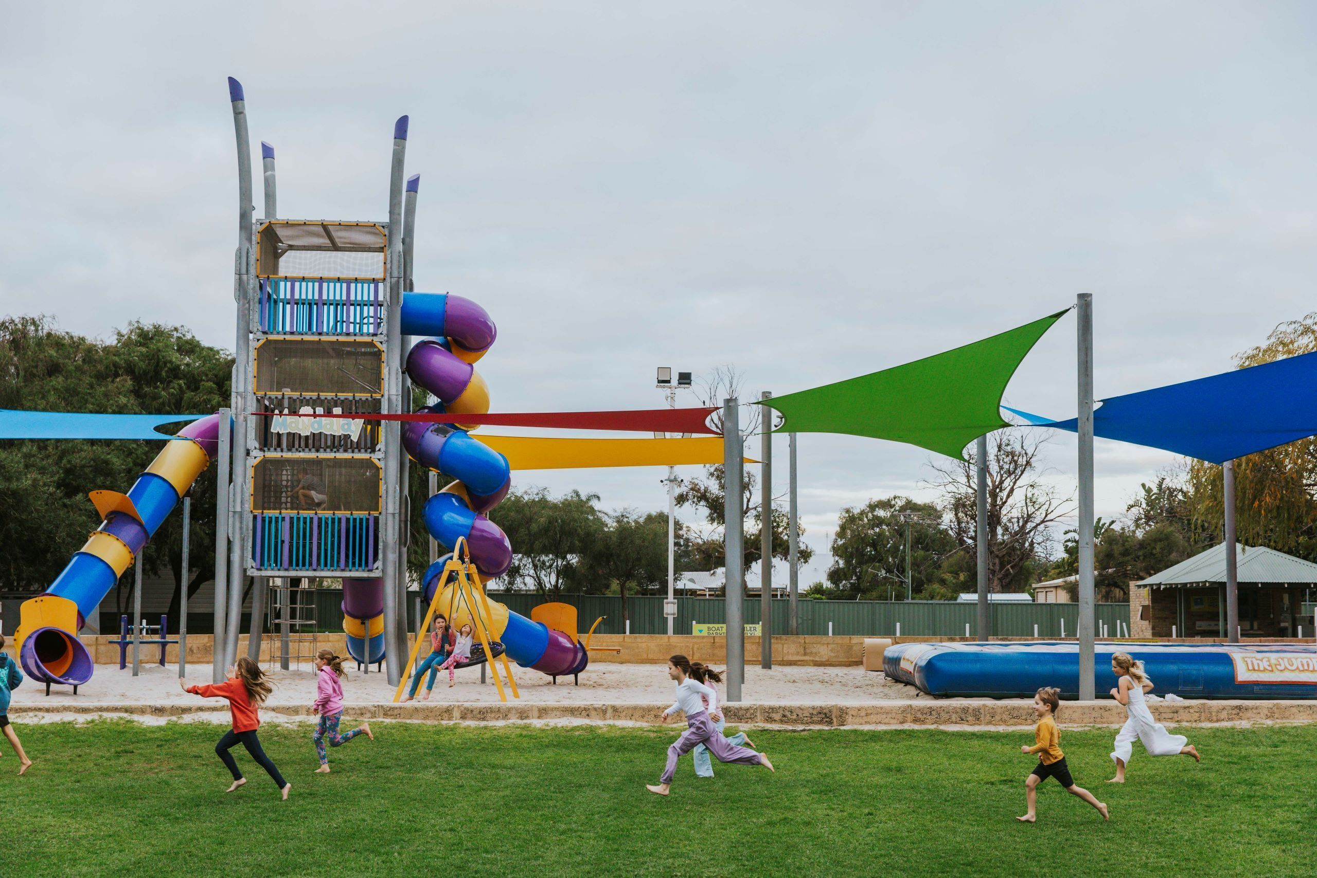 A playground with slides and climbing structures.