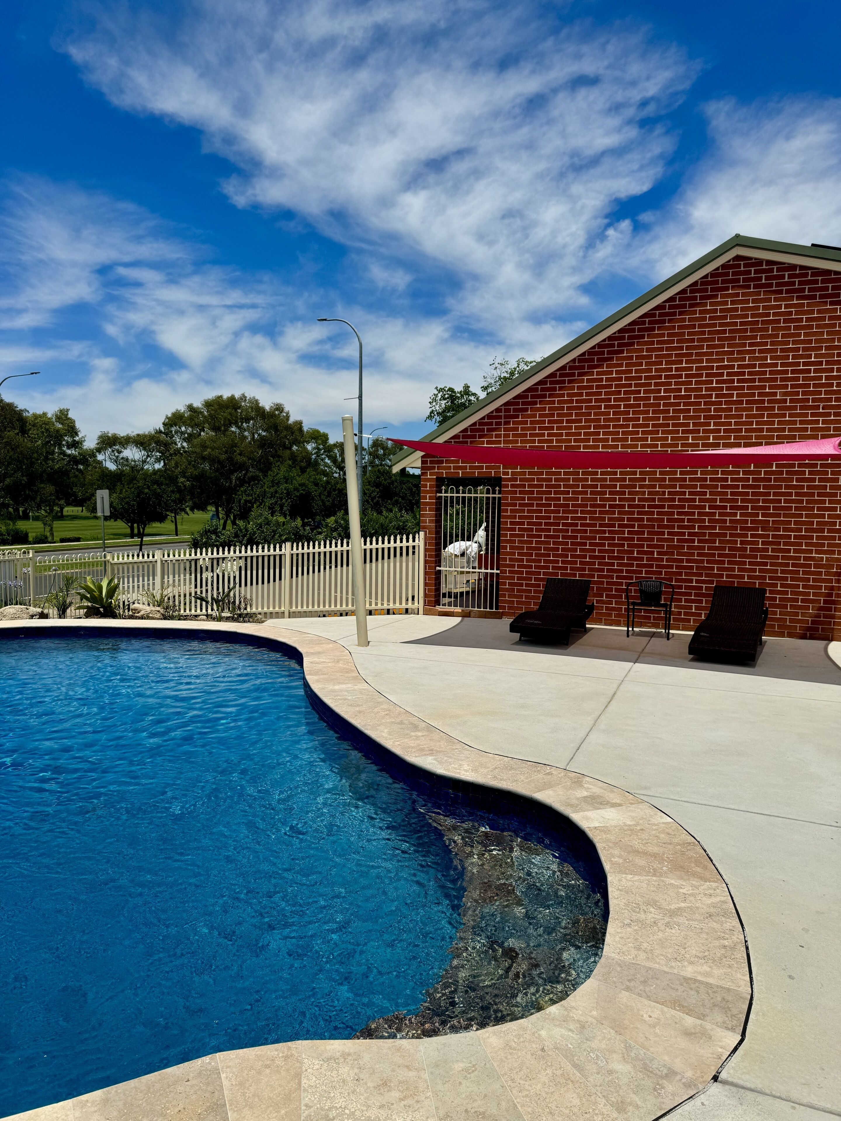 Outdoor pool, open 8:30 AM to 8:30 PM, pool loungers