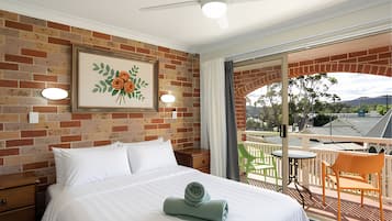 Premium bedding, pillowtop beds, desk, laptop workspace