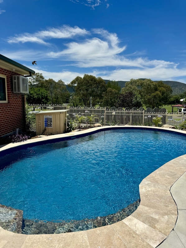 Outdoor pool, open 8:30 AM to 8:30 PM, pool loungers