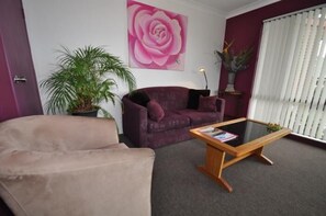 Apartment, 1 Bedroom | Living area | LCD TV, DVD player