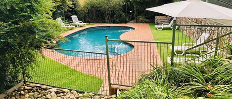 Outdoor pool, pool umbrellas, pool loungers