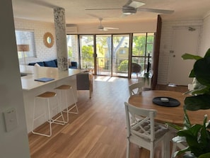 Comfort Apartment, 2 Bedrooms, River View, Poolside | Living area | 60-inch flat-screen TV with digital channels, TV, Netflix - Ocean Vista On Alex (Alexandra Headland)