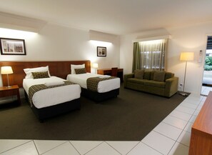 Suite Deluxe | Bureau, fer et planche à repasser, Wi-Fi gratuit, draps fournis