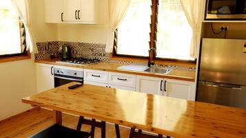 Signature Cabin | Private kitchen | Fridge, microwave, oven, stovetop