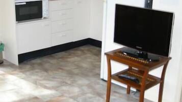 Deluxe Cabin, 2 Bedrooms | Living area | TV, DVD player