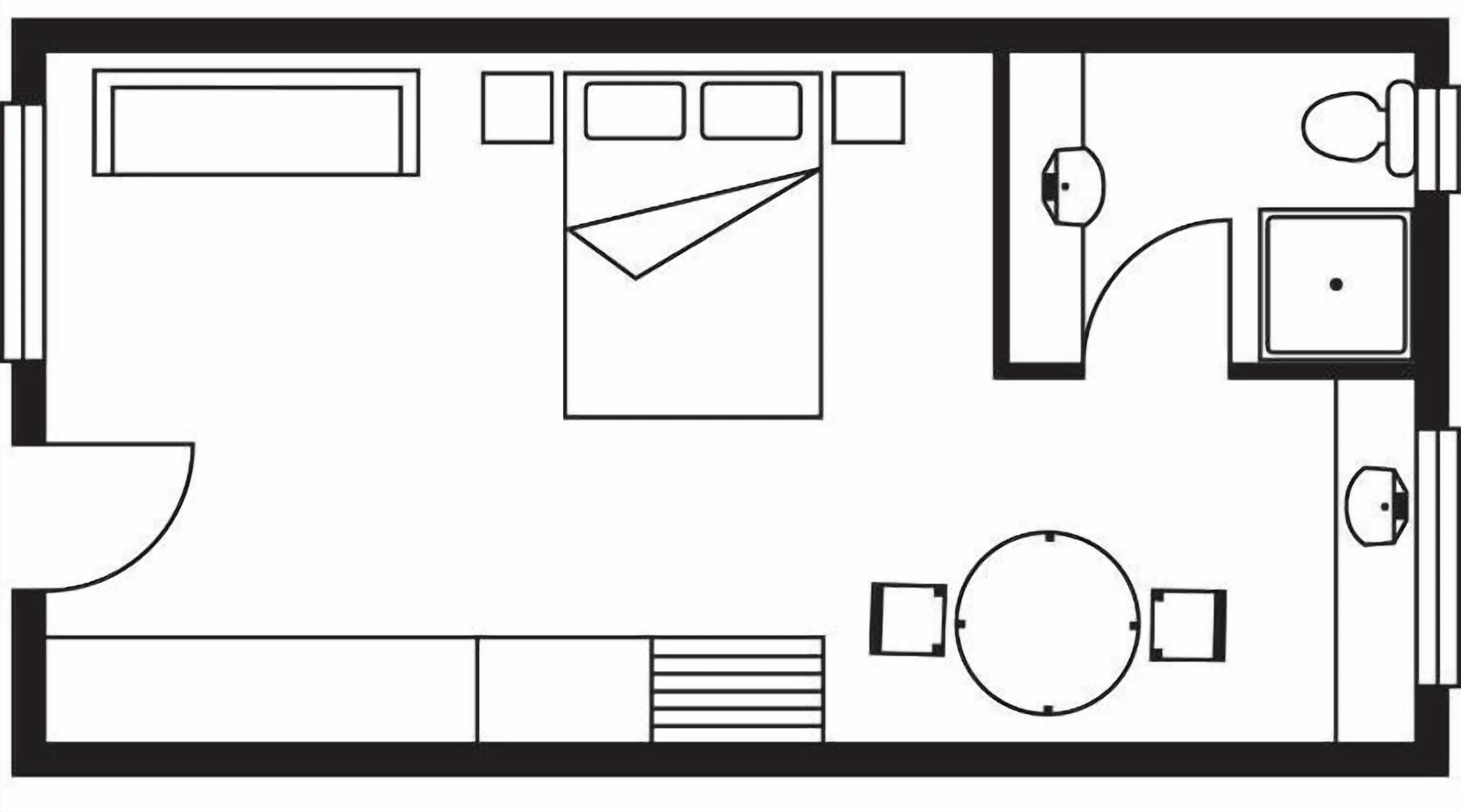 A hotel room layout with a bed, a desk, a chair, a round table, and a small circular table.
