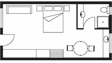 A hotel room layout with a bed, a desk, a chair, a round table, and a small circular table.
