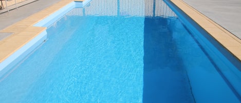 Outdoor pool, open 8 AM to 8:00 PM, pool loungers