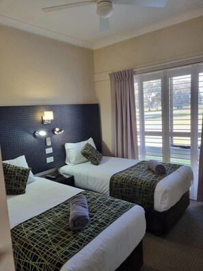 Deluxe Apartment, 1 Bedroom (with Spa Bath) | Desk, blackout drapes, iron/ironing board, free WiFi