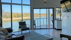 3 Bedroom Apartment - Waterfront | Living area | 32-inch flat-screen TV with digital channels, plasma TV, DVD player