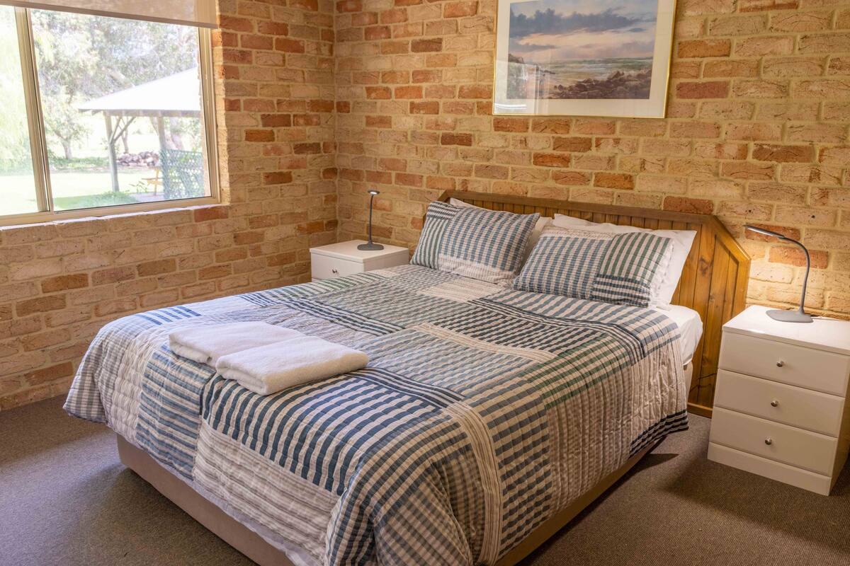 Blackout drapes, iron/ironing board, bed sheets