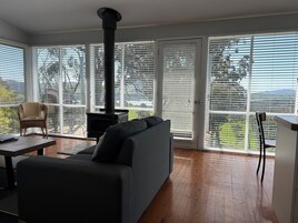 Standard Cottage, 2 Bedrooms, Non Smoking, Lake View (Acacia Cottage) | Living area | Flat-screen TV, fireplace, DVD player