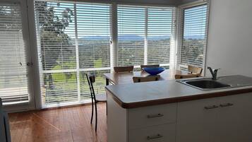 Standard Cottage, 2 Bedrooms, Non Smoking, Lake View (Acacia Cottage) | Living area | Flat-screen TV, fireplace, DVD player