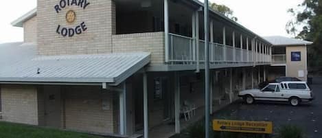 A building with a sign reading "Rotary Lodge".