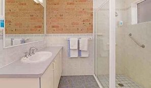 Shower, rainfall showerhead, towels