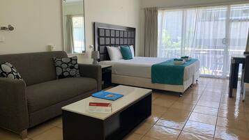 Desk, blackout curtains, soundproofing, iron/ironing board