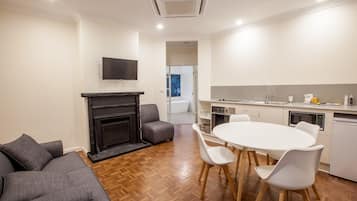 Apartment, 2 Bedrooms | Living area | Flat-screen TV, MP3 dock