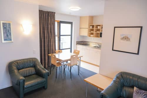 Apartment, 2 Bedrooms (1 Queen and 2 Single beds) | Living area