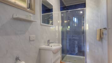 Shower, free toiletries, hair dryer, soap