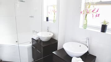 Hair dryer, towels, soap, shampoo
