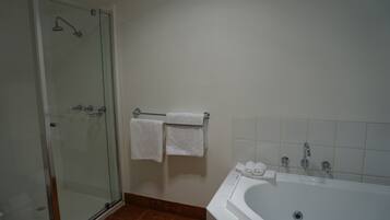 Separate tub and shower, jetted tub, free toiletries, hair dryer