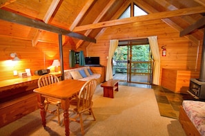 Cottage, 1 Bedroom, Non Smoking, Kitchen (Bower Bird) | Living area | Flat-screen TV, fireplace, iPod dock - Mt Glorious Getaways (Mount Glorious)