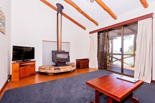 Cabins | Living area | TV, fireplace