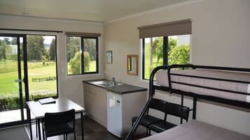 Deluxe Cabin with Shared Bathroom | Laptop workspace, soundproofing, free cribs/infant beds, free WiFi