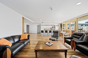 2 Bedroom Plaza Apartment | Living area | Smart speakers - Jenatt Apartments Salamanca (Battery Point)
