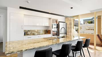 2 Bedroom Plaza Apartment | Private kitchen | Full-sized fridge, microwave, oven, stovetop