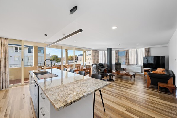 2 Bedroom Plaza Apartment | Living area | Smart speakers